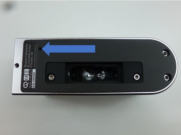 Image showing the reset button location on the underside of a Rhopoint IQ