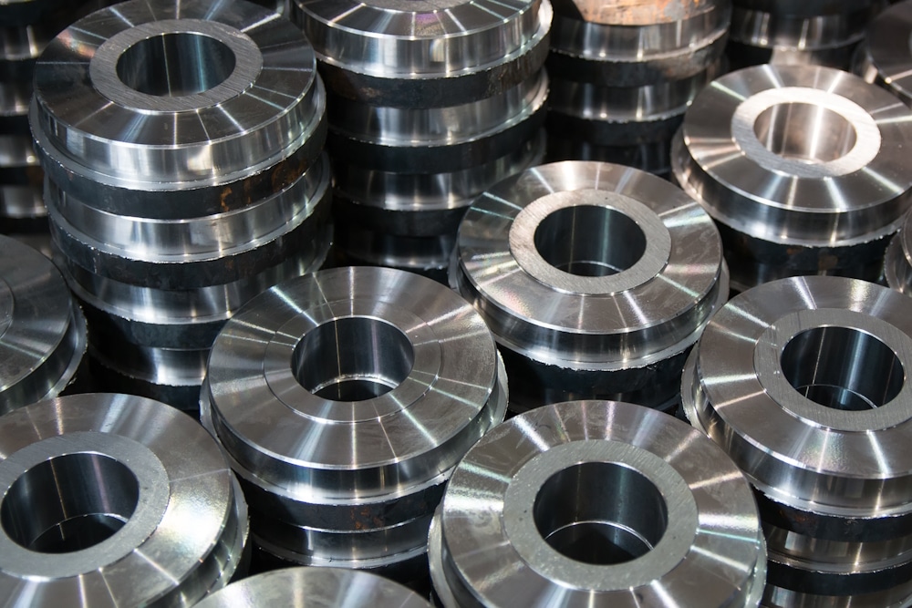 Steel parts made on lathe machine highlighting metal finishing applications